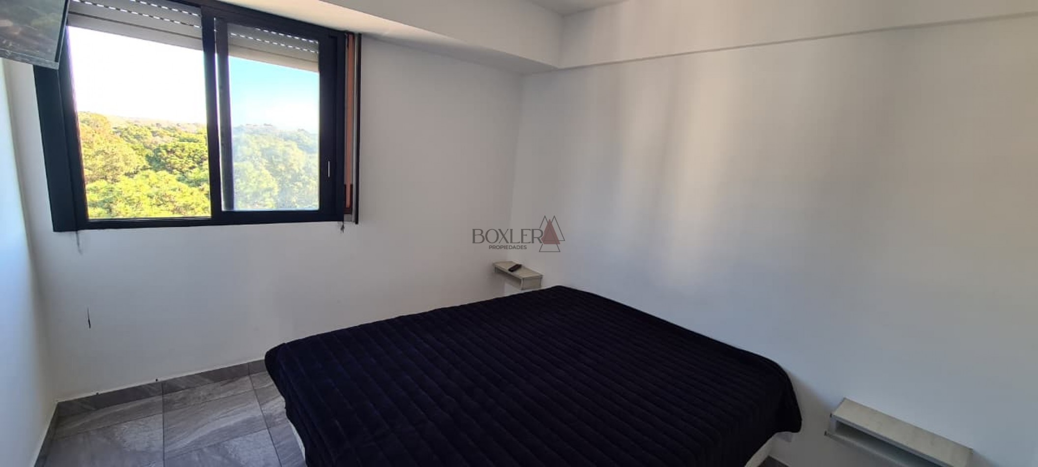 Luminoso departamento con 2 dormitorios y 2 baños en zona centrica