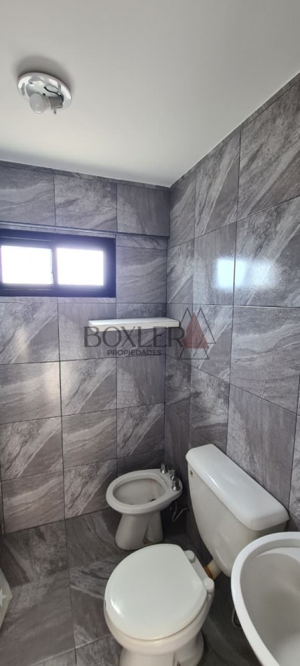 Luminoso departamento con 2 dormitorios y 2 baños en zona centrica
